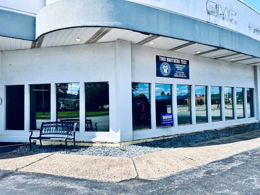 Commercial building corner with reflective window tint and privacy film