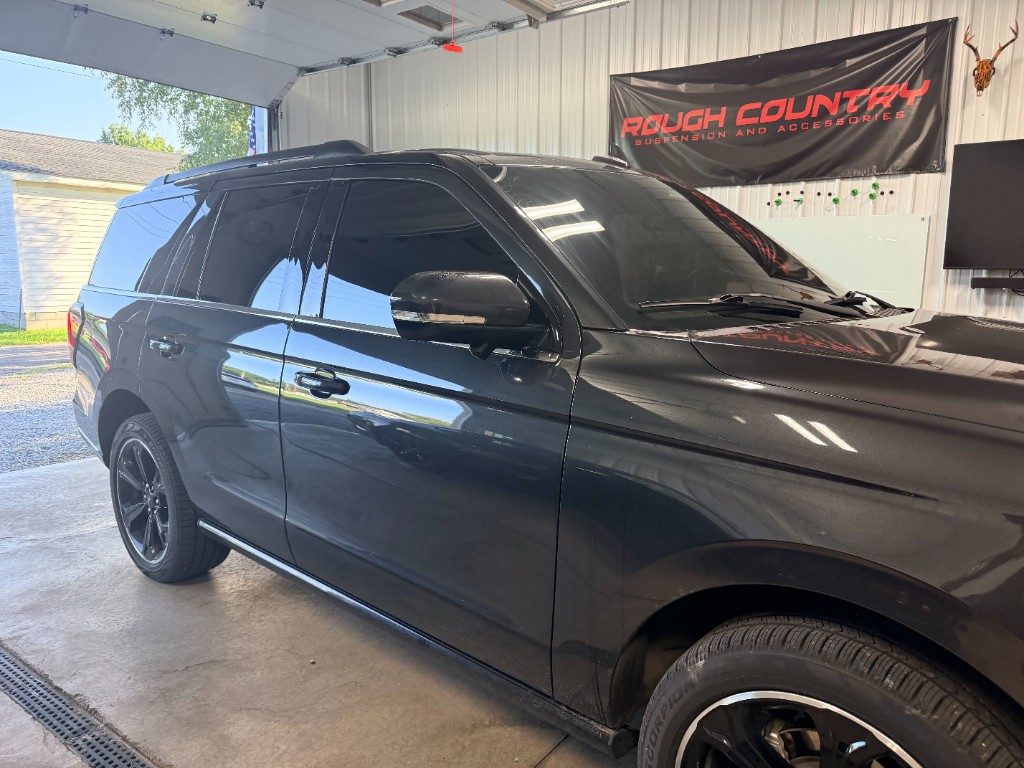 Ford Expedition with dark tint finished at Black Label Tint